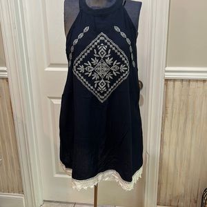 Never worn, navy blue with white embroidered stitching and white crotchet edge.